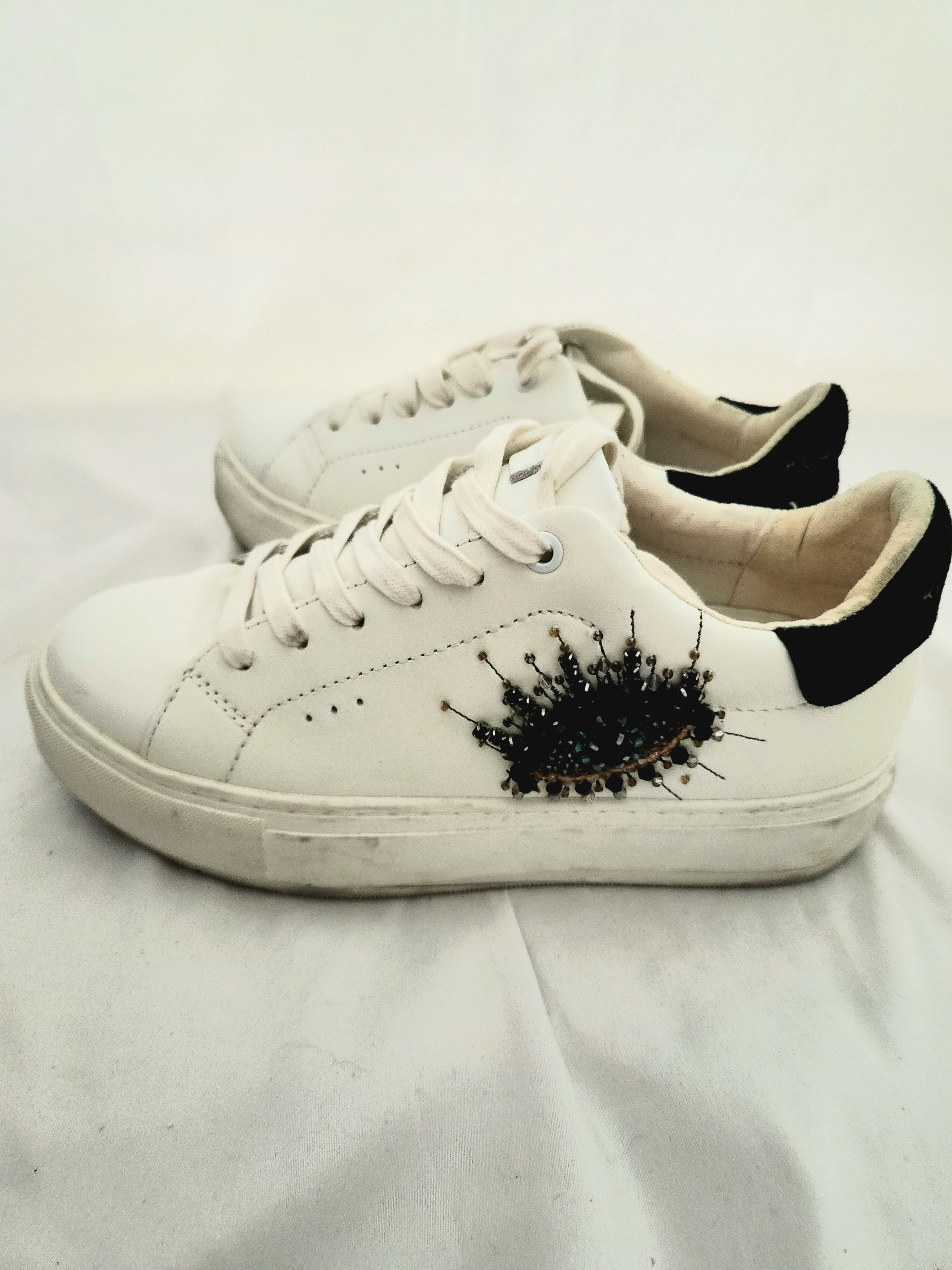 Kurt Geiger White Low-Top Sneakers With Black Heel And Embellishment